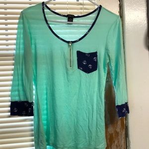 Rue 21 women’s medium shirt.